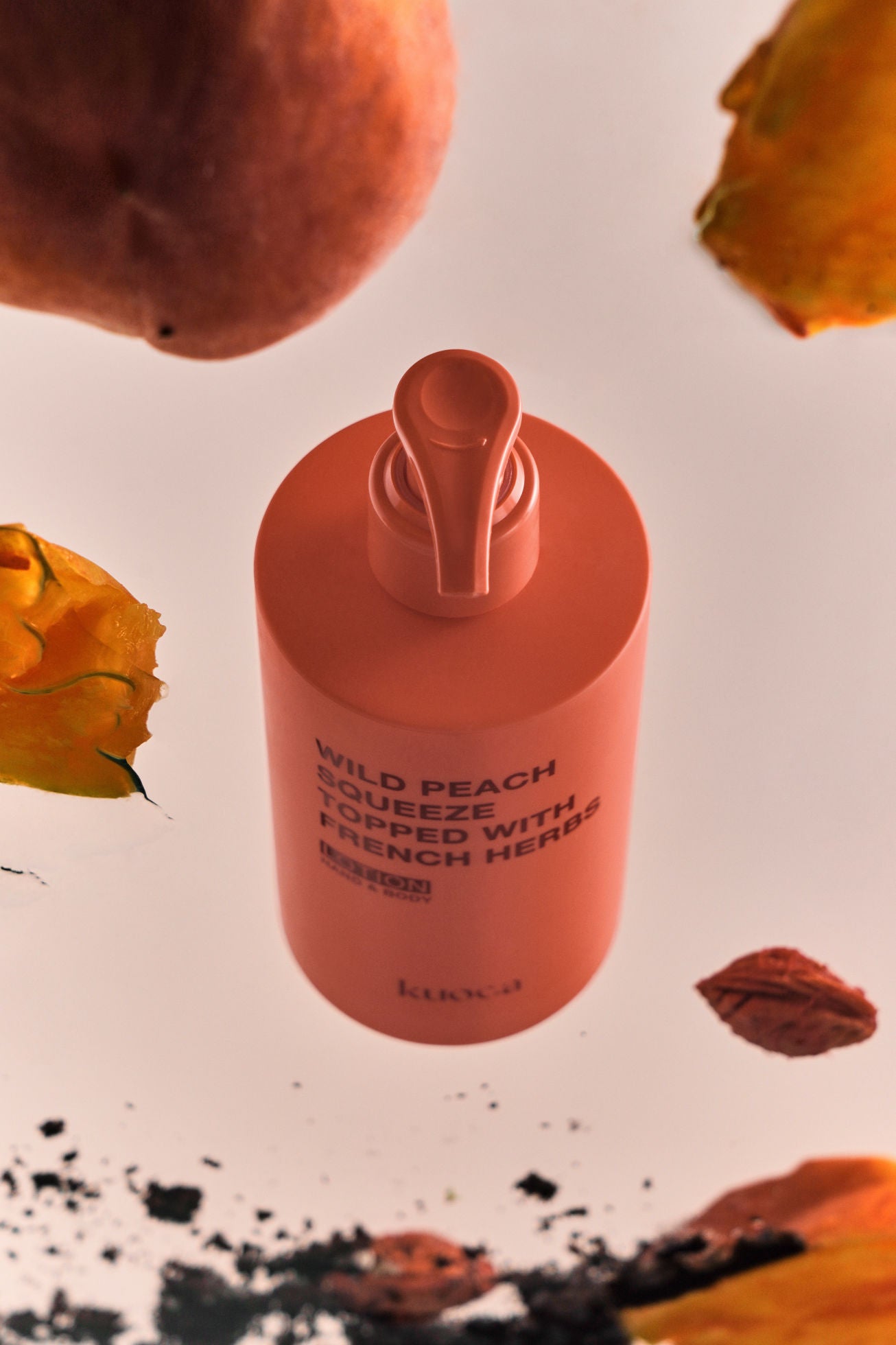 KUOCA Wild Peach Squeeze Topped with French Harbs Hand & Body Lotion