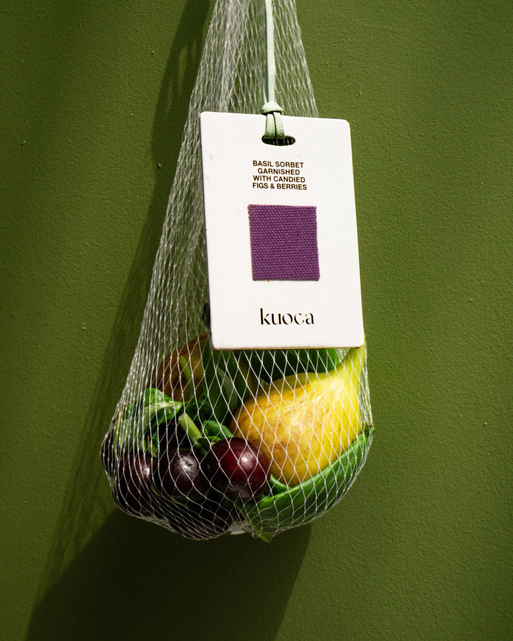 KUOCA Basil Sorbet Garnished with Candied Figs & Barries Fragrance Tag