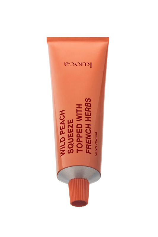 KUOCA Wild Peach Squeeze Topped with French Harbs Hand Cream